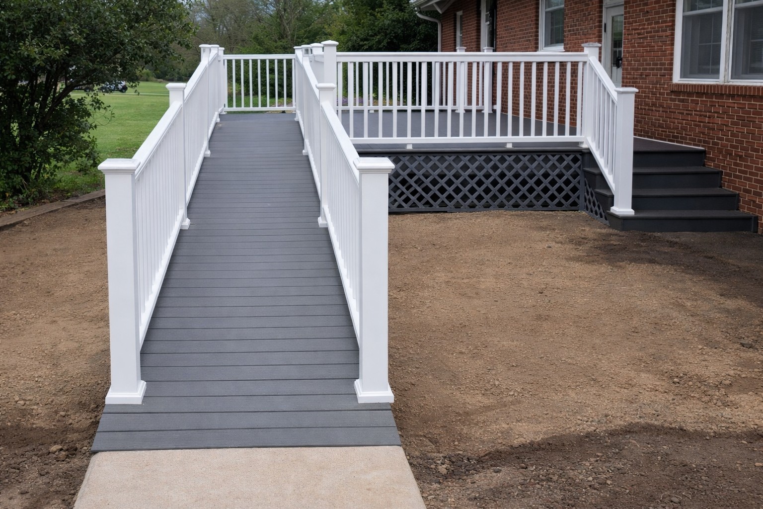 Custom wheelchair access ramp with white railings